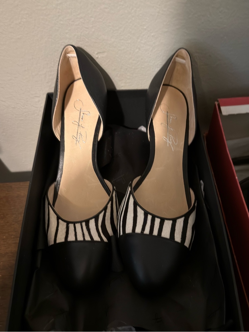 Black & white zebra print custom made shoes, closed toed with 1" wedge heel.